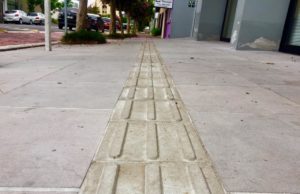 Em locais da cidade, calçadas ainda são um problema