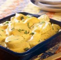 Batatas ao requeijão e cheddar